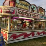 Carnival food stand with bright signage